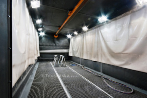 blasting room with tracks for a work car