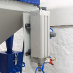 micro-blaster installed on a sandblasting machine